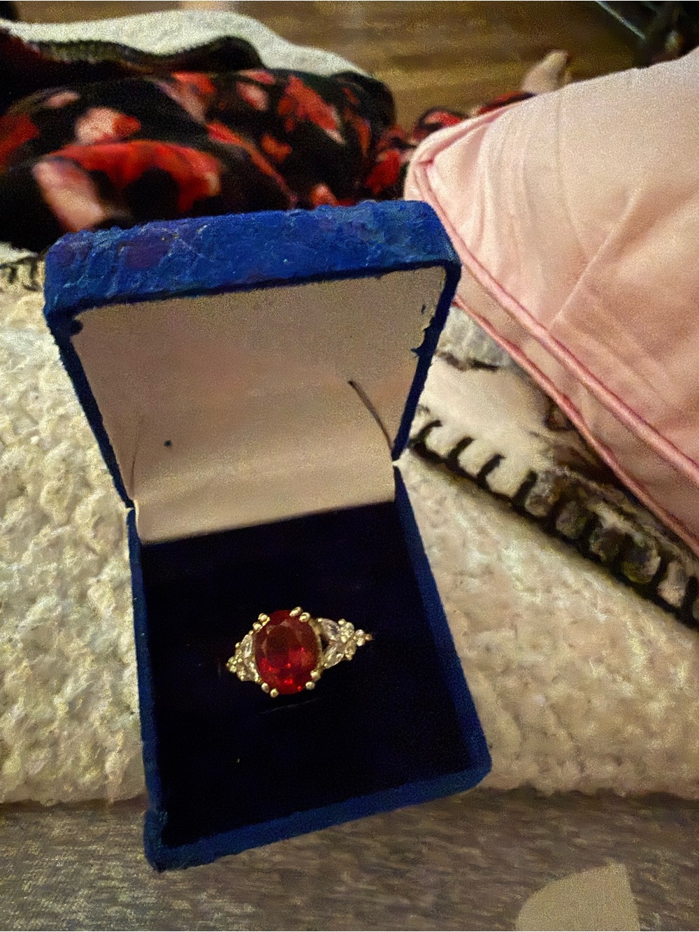Natural Garnet ring with white sapphires on each side.